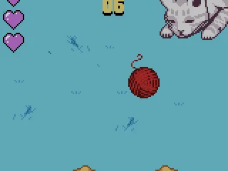 
											Playing a mini-game with your cat