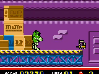 
											The green M&M can send kisses to beat some enemies but not crates.