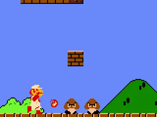 
											Fire Mario shoots a jumping flame ball in his next target: a double of Goombas.