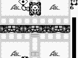 
											Japanese version final boss. No skull motif in this version only the initials AK. The boss holds up a traditional fan.