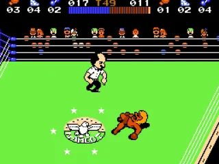 
											He' down. The referee is counting down.