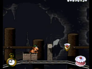 
											After some time in a mine cart, Yogi finds a cake piece, but he must avoid some dangers first...