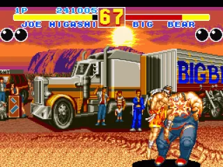 
											Joe Higashi plants his knee in Big Bear's face