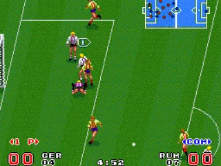 
											The goalie diving for the ball