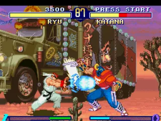 
											Through his projectile-based move Hadou Ken, Ryu is about to stop Katana's (Sodom's) Jigoku Scrape.